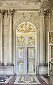 Baroque door in the Palace of Versailles (Versailles, France)