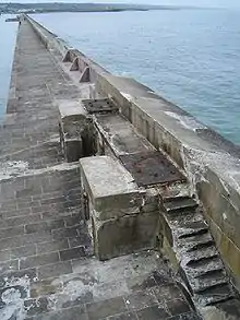 Western wall of the outer harbour