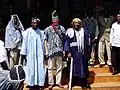 Visit by the US ambassador (wearing traditional indigo clothes) to the Chiefs of Bana (left) and Bandja (right)