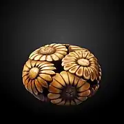 Netsuke depicting chrysanthemums