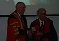 Graeme Clark (right) receiving the 2010 Lister Medal