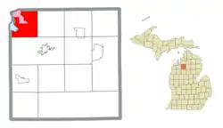 Location within Kalkaska County (red) and the administered community of Rapid City (pink)