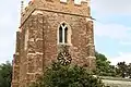 The clock face on the Church of St Mary and All Saints in Hawksworth