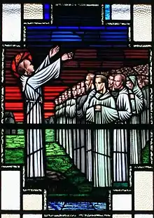 Saint Finnian of Clonard preaches to his monks at Clonard. (Stained glass, 1957).