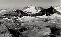 Clyde Peak (left), Blackfoot Mountain (center), Mt. Logan (right).Aerial view from northeast, circa 1925.