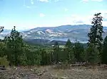 Colville National Forest with a lake and mountains.