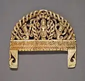 Comb with Vishnu adored by serpents; 1750–1800; ivory with traces of paint; 6.99 by 7.94 centimetres (2.75 in × 3.13 in); from Nepal; Los Angeles County Museum of Art