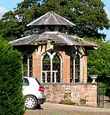 Game larder to the centre of the service court at Combermere Abbey