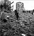 Two photo reporters among the ruins in Via Prima Settembre after the earthquake in Messina, December 1908