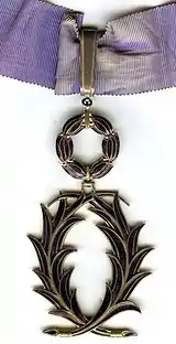 Insignia of Commander of the Ordre des Palmes académiques (Griffon du Bellay attained the degree below of Officier in recognition of his contributions to the advancement of science).