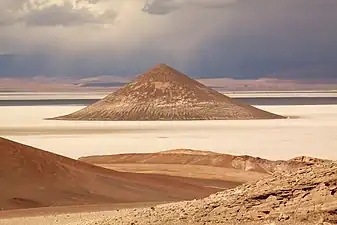 Cono de Arita, a conical sandstone inselberg in the middle of Salar de Arizaro, Argentina