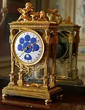 Astronomical clock; by Philippe-Jacques Corniquet; c.1794; gilt bronze and enamel face; unknown dimensions; Musée des Arts Décoratifs, Paris