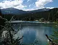 Caumasee in the Flims Forest in front, Crap Sogn Gion left and Vorab, the white mountain to its right. The white Triangel is Crap Ner and Ofen the white peak to its right (Glarus thrust)