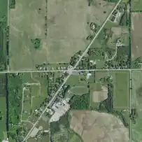 Institute on June 27, 2020, with the town hall and school buildings in the lower part of the photo