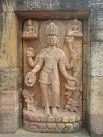 Vajrapani relief panel by entrance.