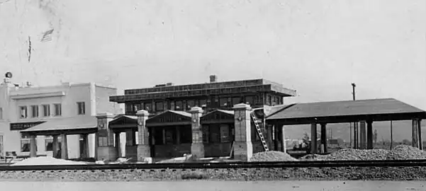 Culver City depot under construction circa 1923; per the Los Angeles Public Library's photo catalog description, the white building to the rear is Harry Culver's real estate office (Los Angeles Herald Examiner Photo Collection)