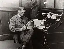 Image 11D. W. Griffith at a rolltop desk, c. 1925 (from 1920s)