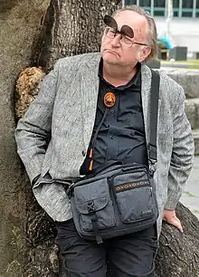 David A. Mason rests against a tree during a RAS Korea event on May 16, 2017.