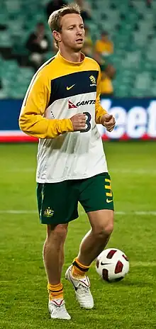 David Carney warming up before a game for Australia