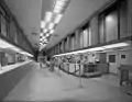 The main hall and lobby area before the restoration; The ceiling has been lowered, and the hall narrowed.