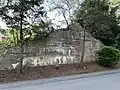 Abandoned and decaying bridge support. (Castle Hill Way, Blackstone, MA)