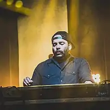 Delgado performing in 2017