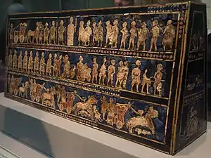 Standard of Ur; 2600–2400 BC; shell, red limestone and lapis lazuli on wood; length: 49.5 cm; from the Royal Cemetery at Ur; British Museum