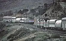 Two trains meet in a valley