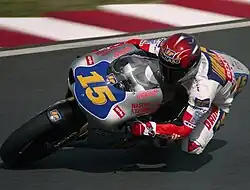 Doriano Romboni, riding his Aprilia RSW-2 500 in the 1996 Japanese Grand Prix.