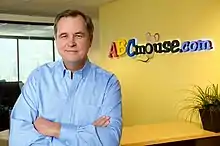 The ABCmouse.com logo and Doug Dohring in 2011.