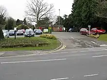 A view of the Lido Park entrance at Droitwich, with the car park and Worcester Road in front