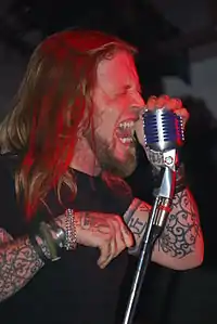 Vocalist Ryan McCombs performing in 2010