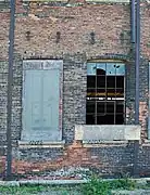 Structure of a machine shop bay.  Note steel framing structural elements framing the bay.