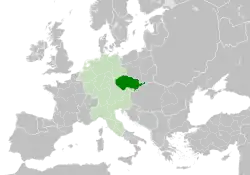 The Czech state in form of Duchy of Bohemia (green) in 11th century, within the Holy Roman Empire (light green).