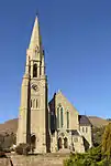 This rectangular stone church building, with its elegant stone tower of 154 feet, is one of the best examples of the Gothic renewal building style. The cornerstone was laid on 20 May 1882 and the building was officially inaugurated on 18 August 1883.
Type of site: Church.
Current use: Church : Dutch Reformed.