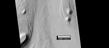 Streamlined feature, as seen by HiRISE under HiWish program Location is Memnonia quadrangle.