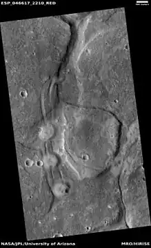 Mud volcanoes, as seen by HiRISE under HiWish program The location is Mare Acidalium quadrangle.  There are many mud volcanoes in Mare Acidalium quadrangle.