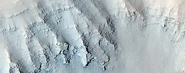 Close view of layers in Louros Valles, as seen by HiRISE under HiWish program Note this is an enlargement of a previous image.