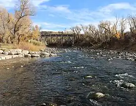 The Eagle River flows through Chambers Park in Eagle