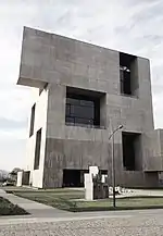 Anacleto Angelini Innovation Center, designed by Pritzker Alejandro Aravena and completed in 2014.