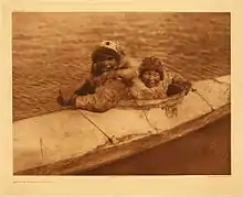 Boys in kayak, Nunivak, 1930