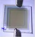 An electrochromic slide in bleached state