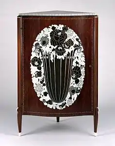 The urn – Corner cabinet made of mahogany with rose basket design of inlaid ivory, by Jacques-Émile Ruhlmann (1923), Brooklyn Museum, New York City