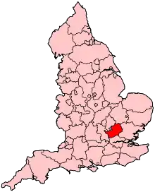 A small county slightly to the south and east of the centre of the country, and completely bounded by other counties.