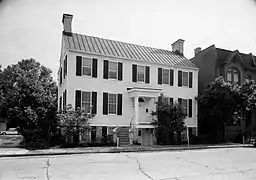 The (estate of) John Eppinger Property was moved to 404 East Bryan Street from 211 West Perry Street