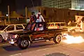 Expatriates from the UAE, participating in the night parade of the Qatar National Day