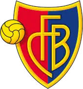 FC Basel crest of a shield, the left half red and the right half blue. The shield is outlined with gold and in the centre in gold letters it reads "FCB". On the left side of the logo is a gold football.