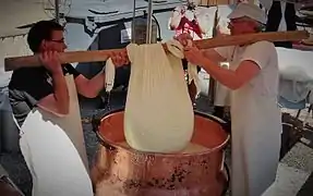 Mass of curd removed in linen cloth