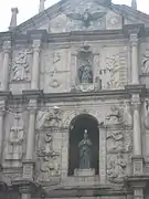 Detail from the Saint Paul church ruins in Macau. The carvings include Jesuit images with Oriental themes, such as The Blessed Virgin Mary stepping on a seven-headed hydra, described in Chinese characters as 'Holy Mother tramples the heads of the dragon'.