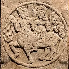 Female riding a Centaur. Centaurs are generally considered as Western borrowings.